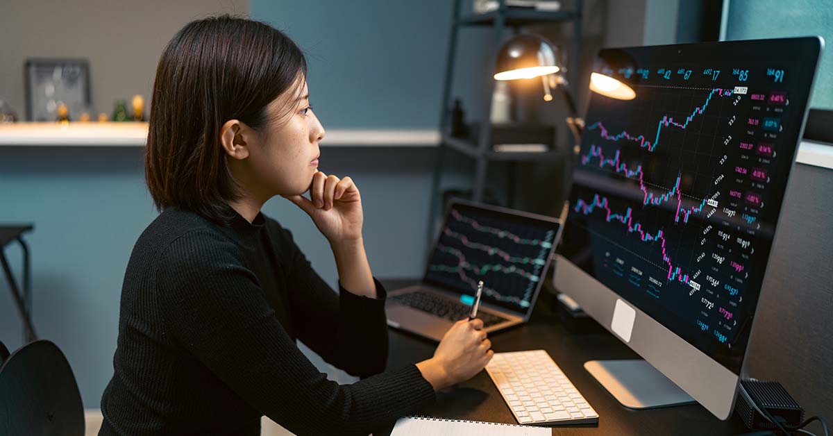 woman looking at a computer